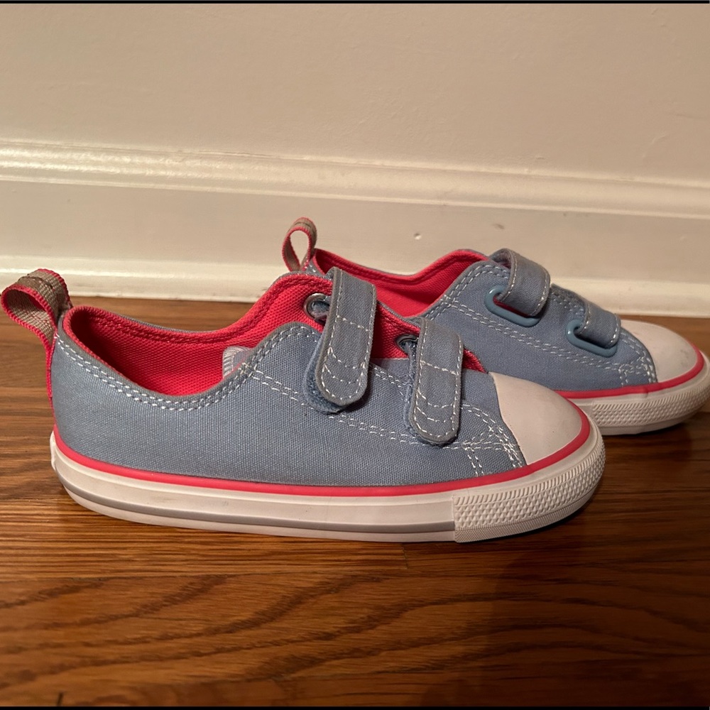 Never worn light blue Velcro low Converse.